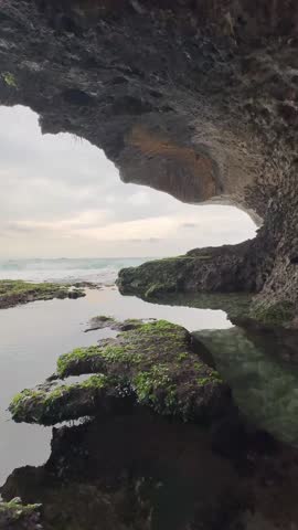 Scenery on the southern coast of Java Island with crashing waves