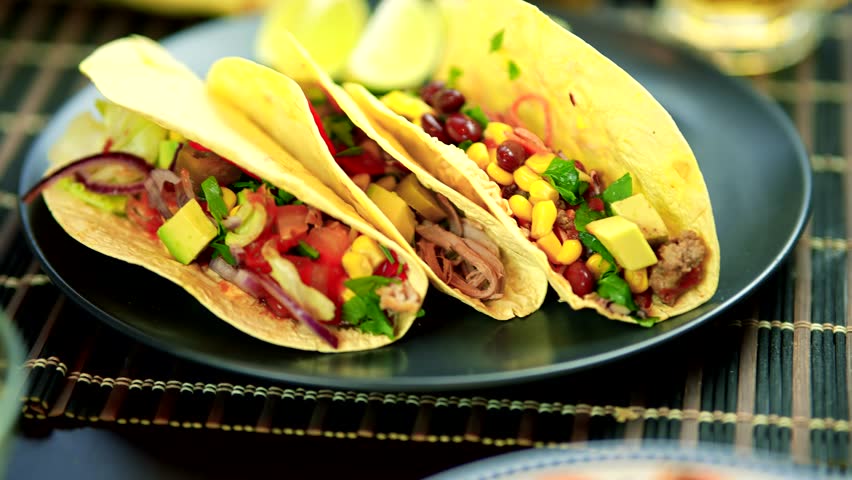 Tasty Mexican Tacos Filled Meat. Homemade American Soft Shell Beef Tacos. Mexican Food Burrito. Tortilla Fast Food. Mexican Pork Carnitas Tacos Fajitas. American Taco Salsa Corn Tortilla Carne Asada