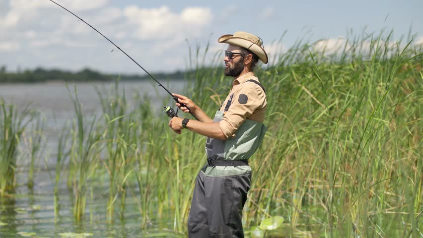 Ultralight Fishing Pike And Zander. Angler Braid And Lures. Recreation Sport Fishing. Angler Catch Zander On Rod. Fluorocarbon Lures Perch Catch.Angler Hobby. Fisher Spin Reel.   Graphite Spinning Rod