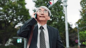 Phone call, city and mature Asian man travel for morning commute and talking, chat and speaking. Professional, corporate and Japanese person on smartphone for communication, networking and contact - Powered by Shutterstock - Get 15% off with code: PIKWIZARD15
