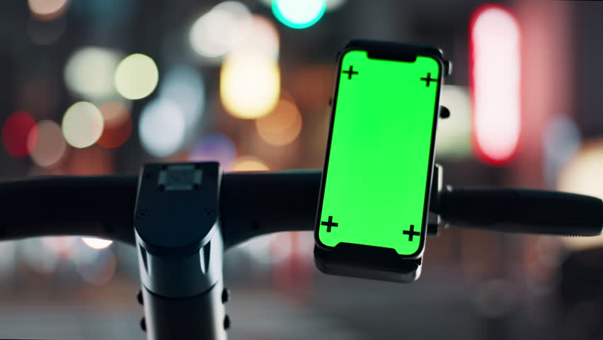Outdoor, bike and smartphone with green screen, street and transport for commuting, night and app. Road, electric scooter and mobile with map of city, tech and display of tracking markers in Japan