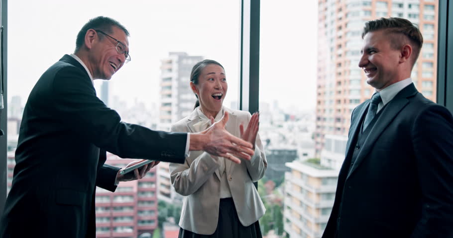 Business people, partnership and welcome with handshake or applause for promotion, contract or deal. Teamwork, onboarding and collaboration as project management, staff or career development in Japan