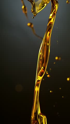 Super Slow Motion Shot of Pouring Oil . Filmed on High Speed Cinematic Camera at 1000 FPS