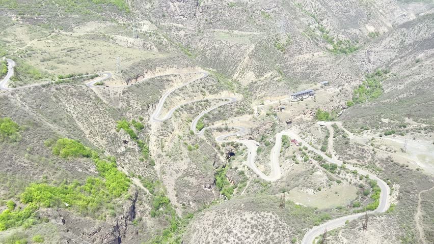 Airview from cable car in the longest ropeway cabin Wings of Tatev between Halidzor and Tatev monastery on canyon in spring time. Up the hill in nature park
