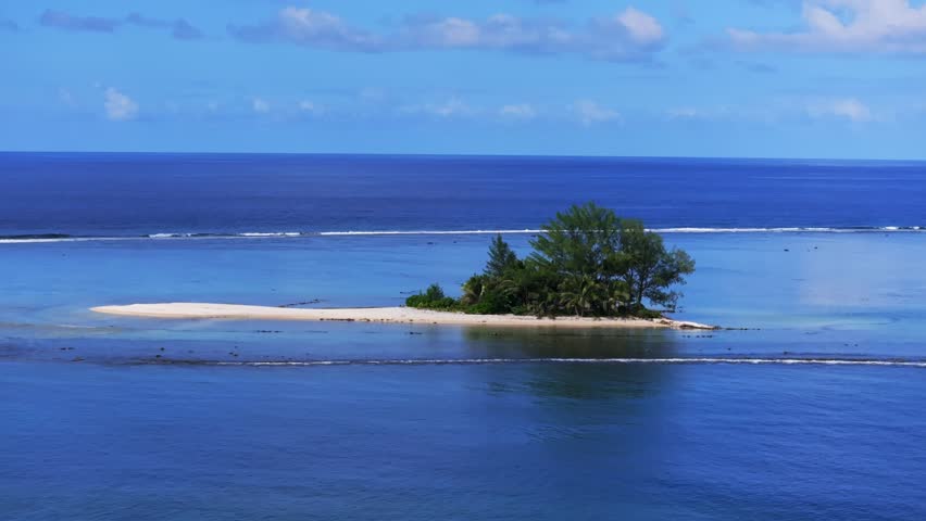 Lost lone island Papeete Tahiti Tapahi Moto Au Mahina Orafara Ahonu French Polynesia aerial drone turquoise water clear water barrier coral reef white sandy beach palm trees swim snorkel circle left