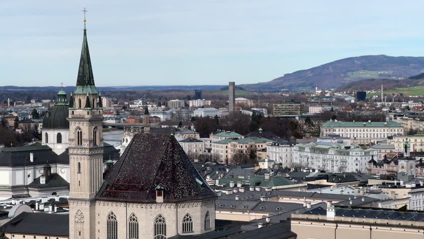 Tower And Roof Of Franciscan Church On Sunny Day In Salzburg, Austria. static shot