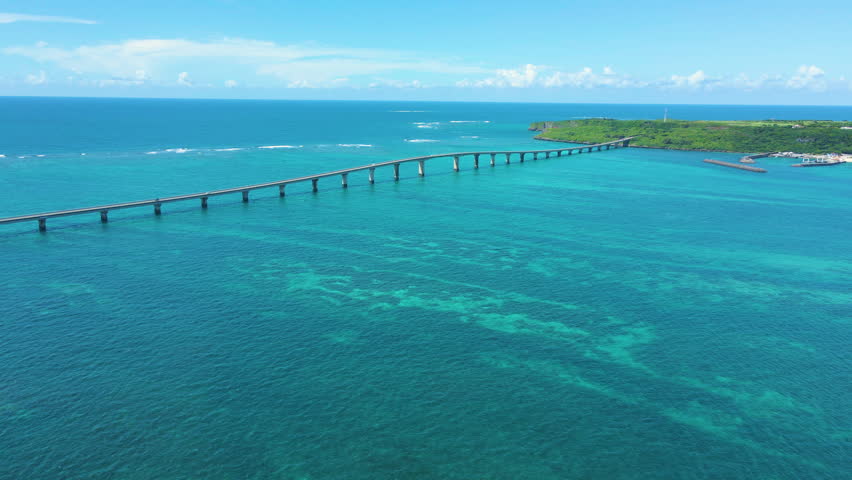Cinematic aerial flyover of Yonaha Maehama Beach in Miyakojima Island in Okinawa, Japan