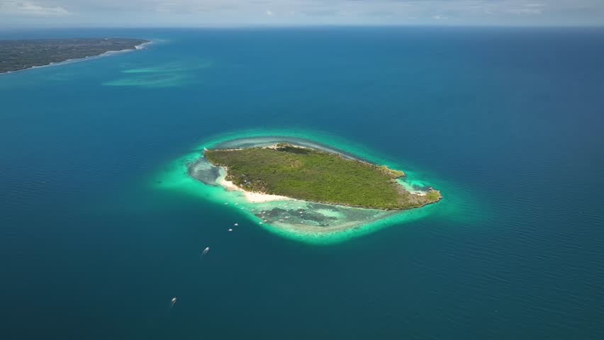 Little Virgin Island Surrounded By Blue Sea Near Bantayan Island In Cebu, Philippines. - aerial shot