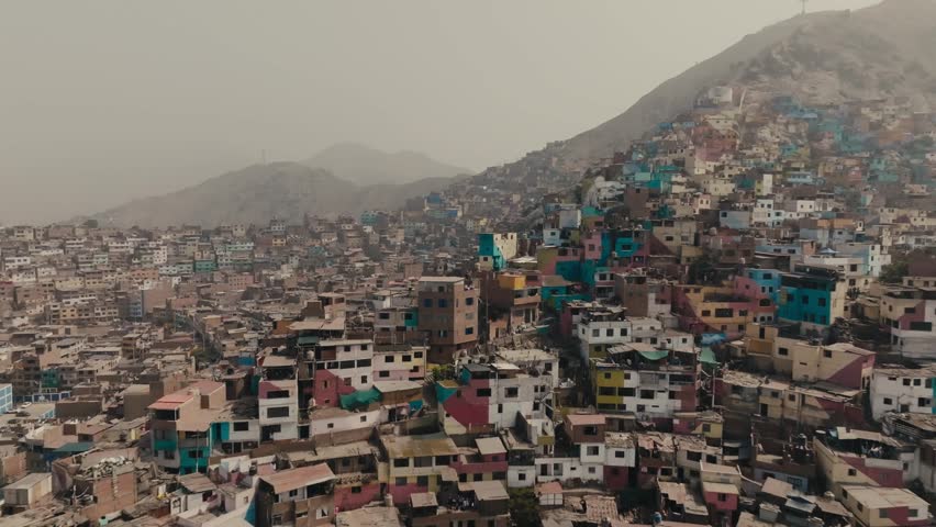 Crowded Settlements Of Cerro San Cristobal In Lima, Peru. Aerial Drone Shot