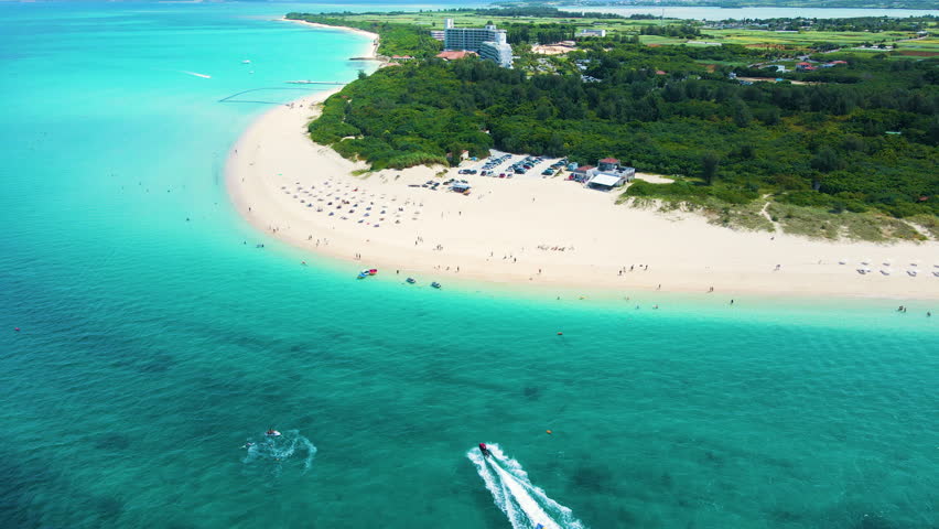 Cinematic aerial flyover of Yonaha Maehama Beach in Miyakojima Island in Okinawa, Japan