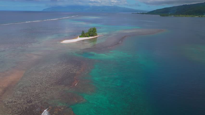 Lost lone island beach Papeete Tahiti Tapahi Moto Au Mahina Orafara Ahonu French Polynesia aerial drone aqua turquoise clear water barrier coral reef white sand palm trees swim snorkel forward pan up