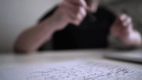 Man journaling thoughts into notebook - Powered by Shutterstock - Get 15% off with code: PIKWIZARD15