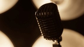 Illuminating vintage microphones stand against vibrant lights, crafting an enchanting atmosphere. The radiant backdrop enriches the setting, ideal for music and performance environments - Powered by Shutterstock - Get 15% off with code: PIKWIZARD15