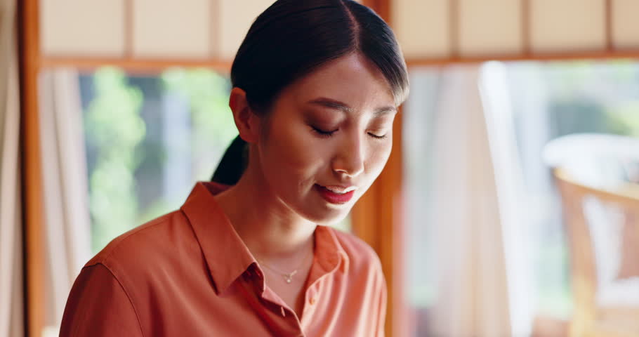 Eating, food and Asian woman with crispy rice at lunch for in home with healthy meal and nutrition. Hungry, person and dish for diet, wellness and taste with chopsticks and snack at house in Japan