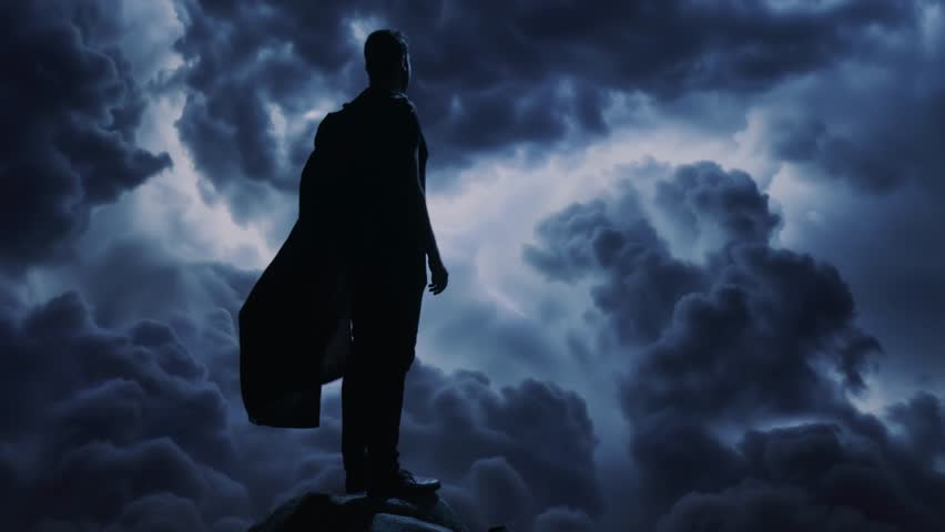 Silhouette Hero Standing On Mountain Peak Against Dramatic Stormy Clouds Leadership Power