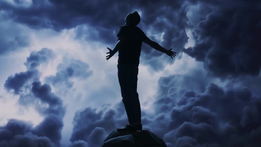 Silhouette Figure Standing On Peak Against Dramatic Storm Clouds Freedom Hope Inspiration