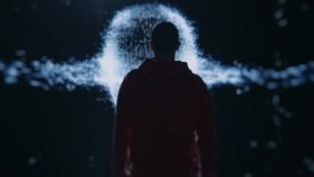 Man Facing Futuristic AI Projection Depicting a Digital Threat in Abstract Environment - Powered by Shutterstock - Get 15% off with code: PIKWIZARD15