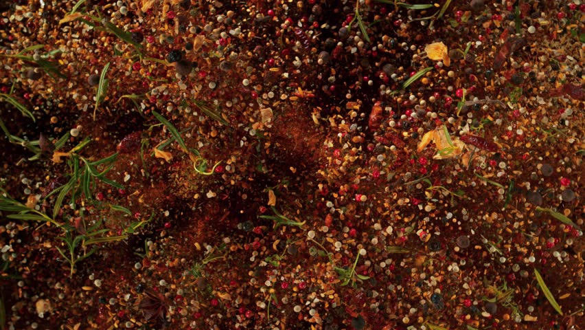 Super Slow Motion Shot Various Spices Mixture Exploding and Rotating Towards Camera at 1000fps.