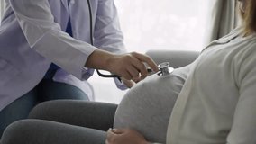 A pregnant woman attends a prenatal check-up with a gynecologist, receiving expert care and guidance for a healthy pregnancy journey. - Powered by Shutterstock - Get 15% off with code: PIKWIZARD15
