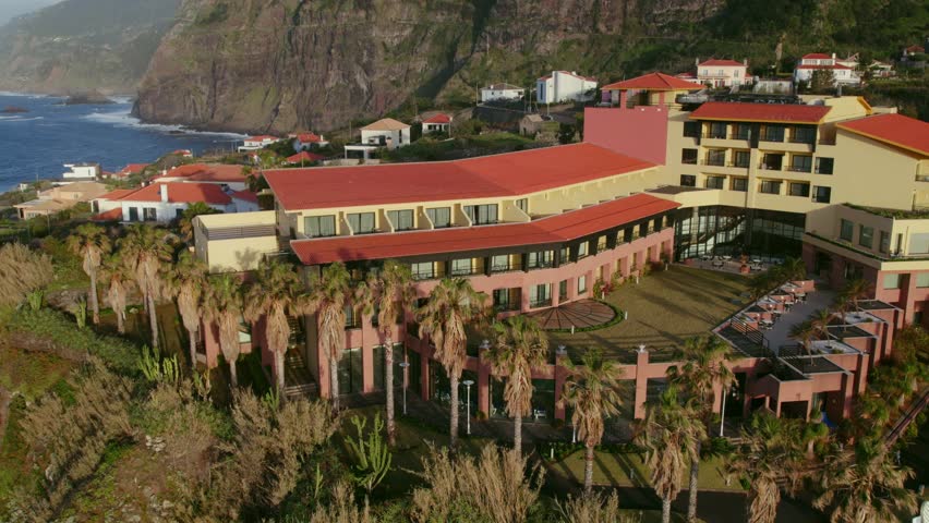 Drone view of the hotel located on the cliff on the shore of the Atlantic ocean