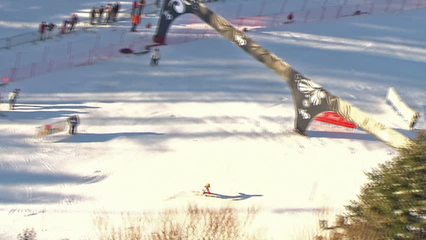 Aerial shot of a skier running down the ski track