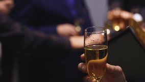 Group of businessmen celebrate, closing successful concluded deal, guests clinking raise glasses with alcohol, sparkling wine, toasting and cheering, colleagues team in office on corporate party event - Powered by Shutterstock - Get 15% off with code: PIKWIZARD15