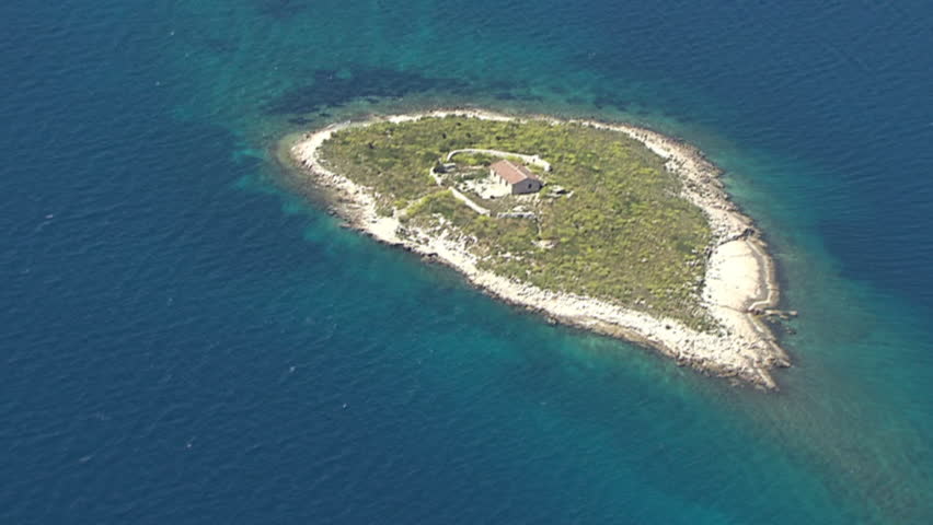 Aerial shot of a house on a small island in Adriatic sea, Kornati islands