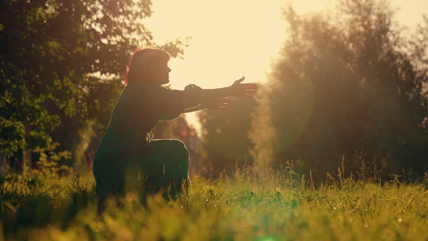 Child boy has fun lawn with his mother in summer. Carefree childhood, joyful embrace of child of mother. Child, son runs to mom, hugs her in park. Happy family Kid. Family Mom kid boy outdoors sun day