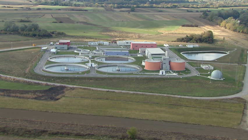 View from above on a Wastewater treatment plant. Aerial helicopter shot.