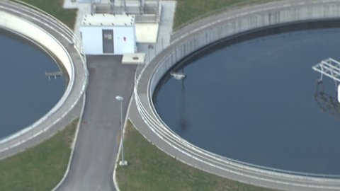 View from above on a Wastewater treatment plant. Aerial helicopter shot.