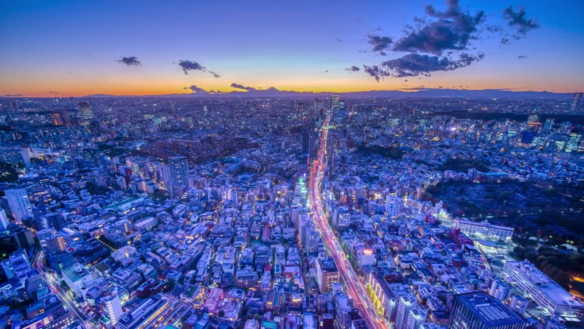 Tokyo big city night view time lapse overlooking Mt. Fuji