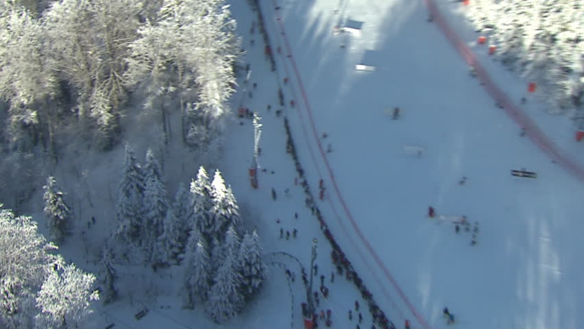 Aerial shot of a skier running down the ski track