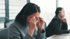 Frustrated, asian woman or agent with headache at call center for stress, anxiety or fatigue at office. Japanese, female person or consultant with headset of migraine for burnout or vertigo at agency - Powered by Shutterstock - Get 15% off with code: PIKWIZARD15