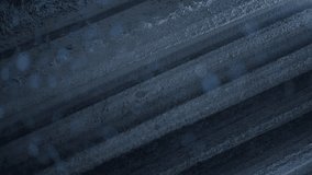 Snow-covered road with a red car driving during a snowstorm, headlights illuminating the icy surface. Concept of winter travel, weather conditions, seasonal transportation challenges - Powered by Shutterstock - Get 15% off with code: PIKWIZARD15