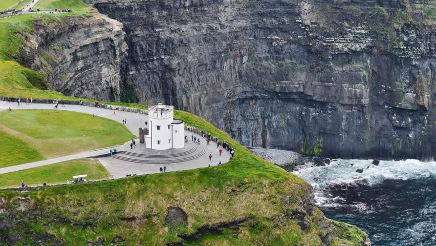 Aerial footage of O'Brien's Tower at the Cliffs of Moher, Ireland