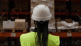 Warehouse worker scanning packages in slow motion - Powered by Shutterstock - Get 15% off with code: PIKWIZARD15