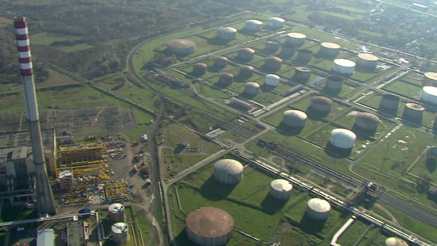 Aerial shot of an oil refinery with oil storage tanks