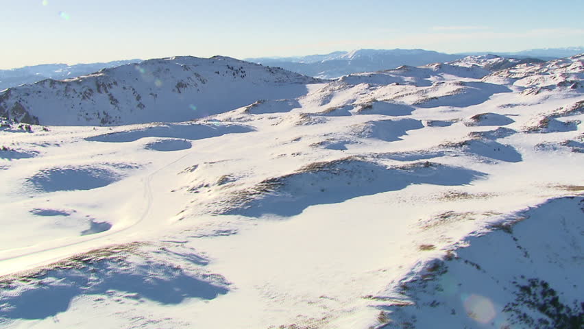 Snow peaks of the mountain Jahorina. Aerial helicopter shot.