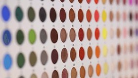 Professional makeup eyeshadow palette. Multicolor glitter eyeshadow and professional makeup eye shadow palette for beauty shots. A huge palette of colorful shadows for professional makeup artists. - Powered by Shutterstock - Get 15% off with code: PIKWIZARD15