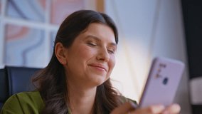 Business lady hands texting mobile phone in corporate workplace closeup. Smiling businesswoman messaging smartphone in modern office. Happy woman freelancer chatting online using cellphone indoors. - Powered by Shutterstock - Get 15% off with code: PIKWIZARD15
