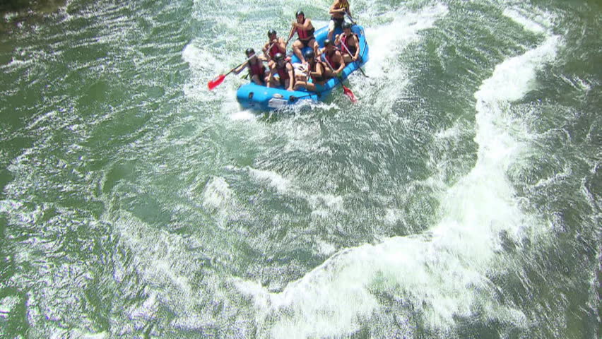 Crane shot of rafting on a wild river