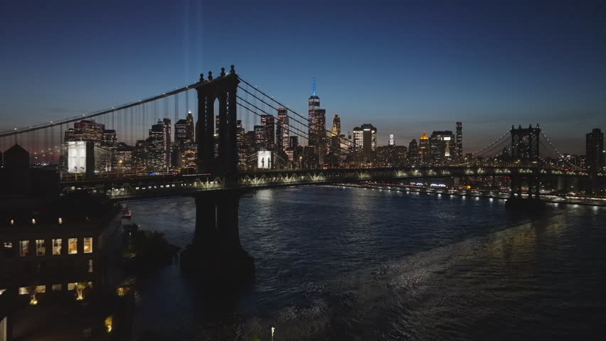 Aerial view of the Manhattan Bridge at dusk. Shot above the East River in New York City.