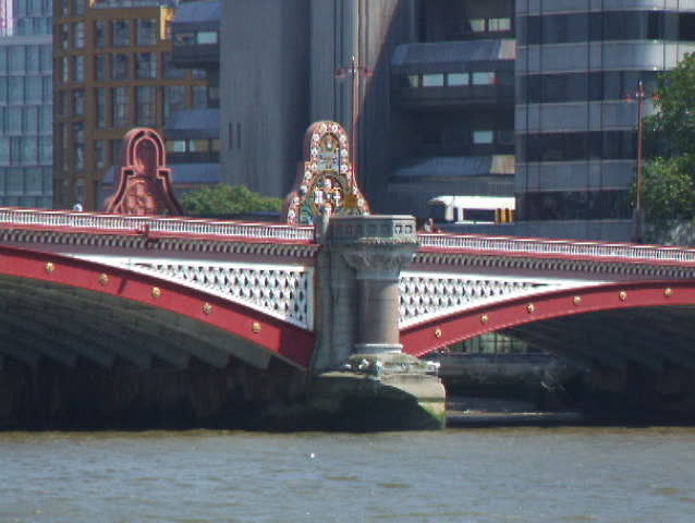 A view  of a bridge over  the River Thames in London.