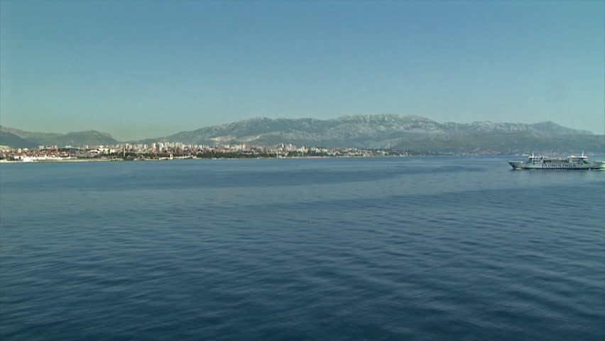 Aerial shot of a Ferry boat in front of port of Split