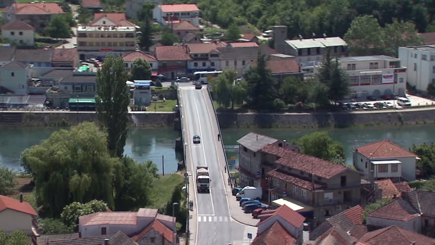 Aerial shot of Bridge across the river Cetina in residential zone