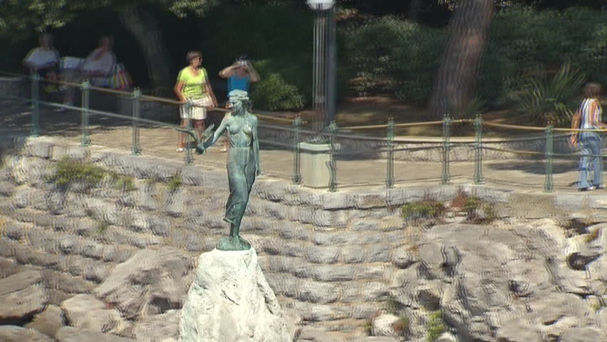 Aerial shot of the City of Opatija and the Statue of the maiden with the seagull, a symbol of the city