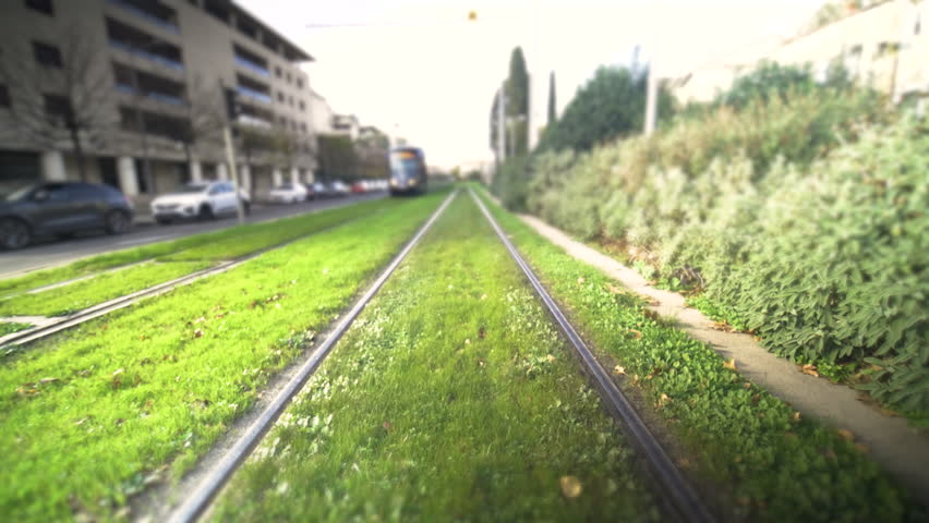 person with a low carbon footprint taking the French public transport tramway in Montpellier. High quality 4k footage