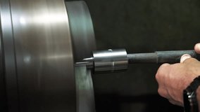 Machinist skillfully operating a metal lathe in an industrial workshop - Powered by Shutterstock - Get 15% off with code: PIKWIZARD15