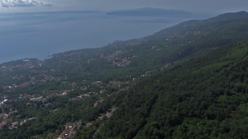 A high altitude flight above the Adriatic coast, Croatia. Aerial helicopter