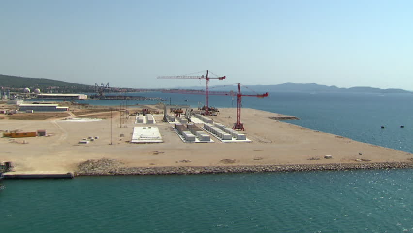 Aerial shot of red cranes in a Cargo Port